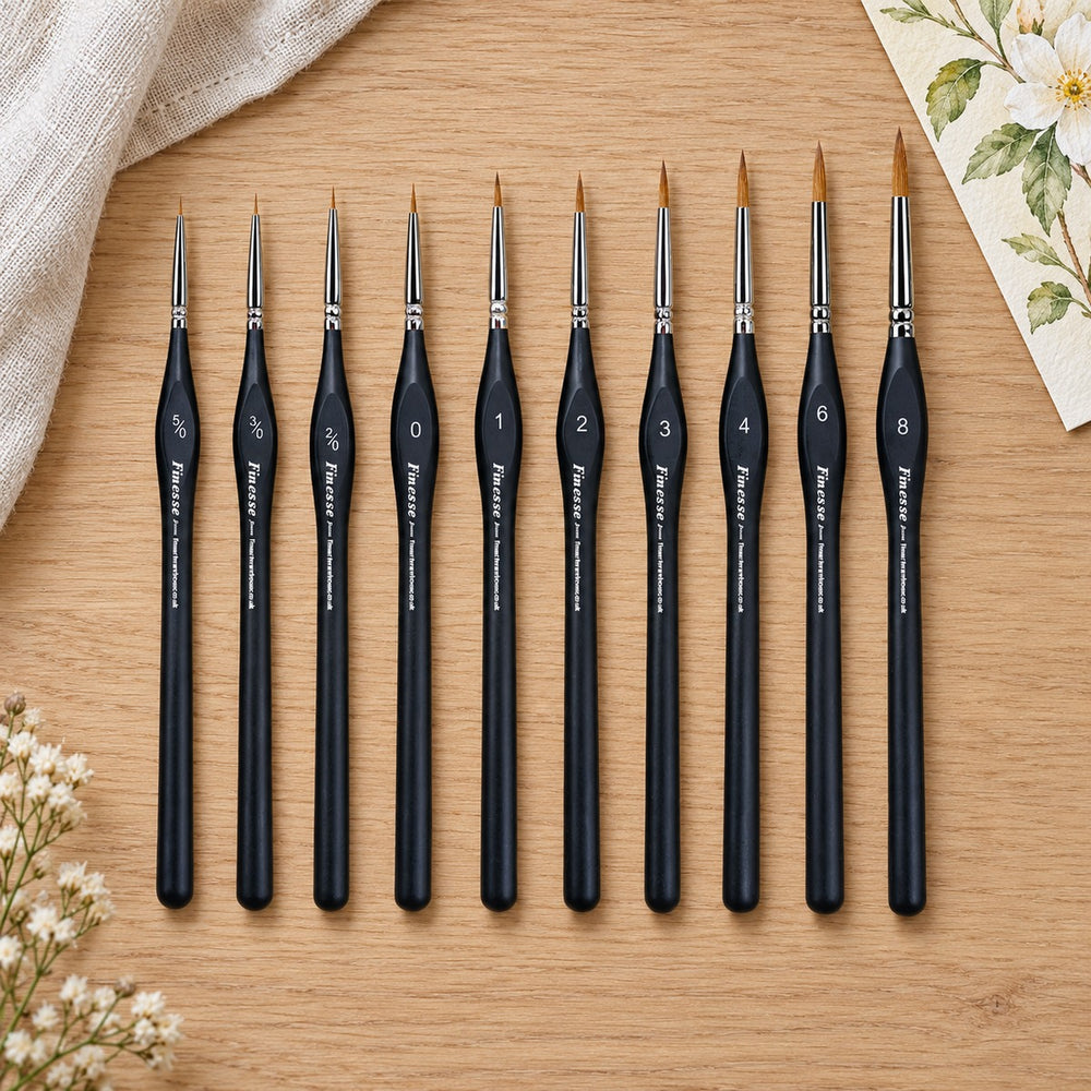 The ten Finesse detail brushes, sizes 5/0 to 8